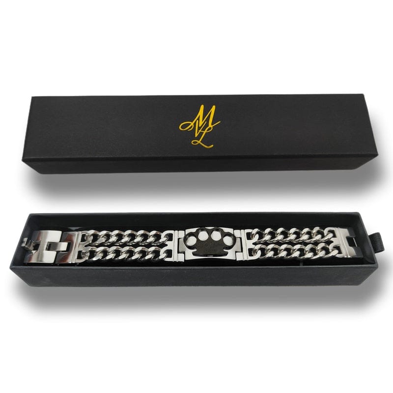 Bracelet Mi Vida Loca MVL argent/noir avec plaque logo MVL noire dans le coffret cadeau ouvert