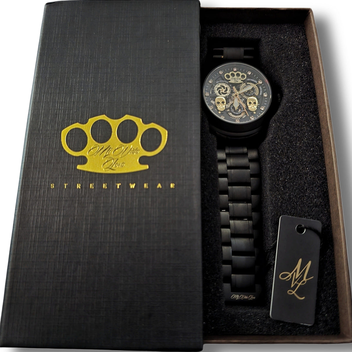Matte black MVL Double skull watch with steel bracelet in the open black gift box with gold MVL logo