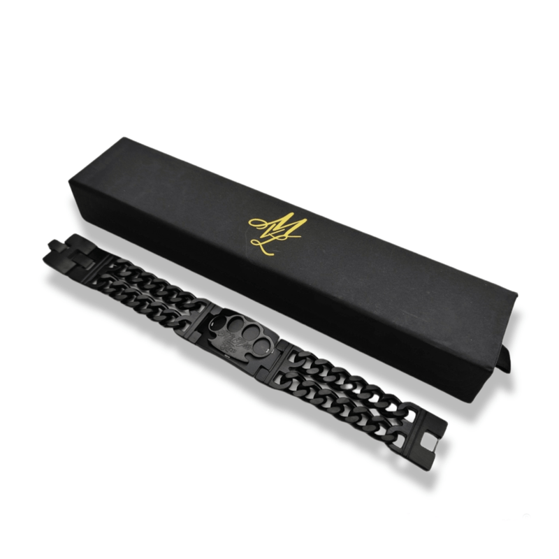 Bracciale MVL Black line nero a maglie davanti alla scatola chiusa con logo dorato