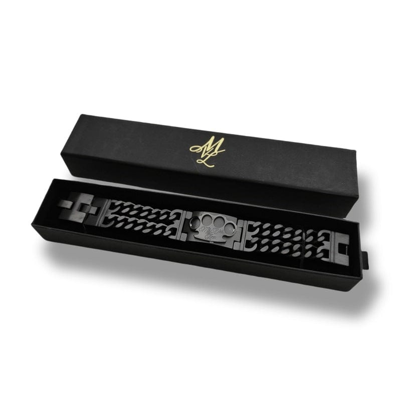 Bracciale Mi Vida Loca Black line nero con placca logo MVL nella scatola nera aperta